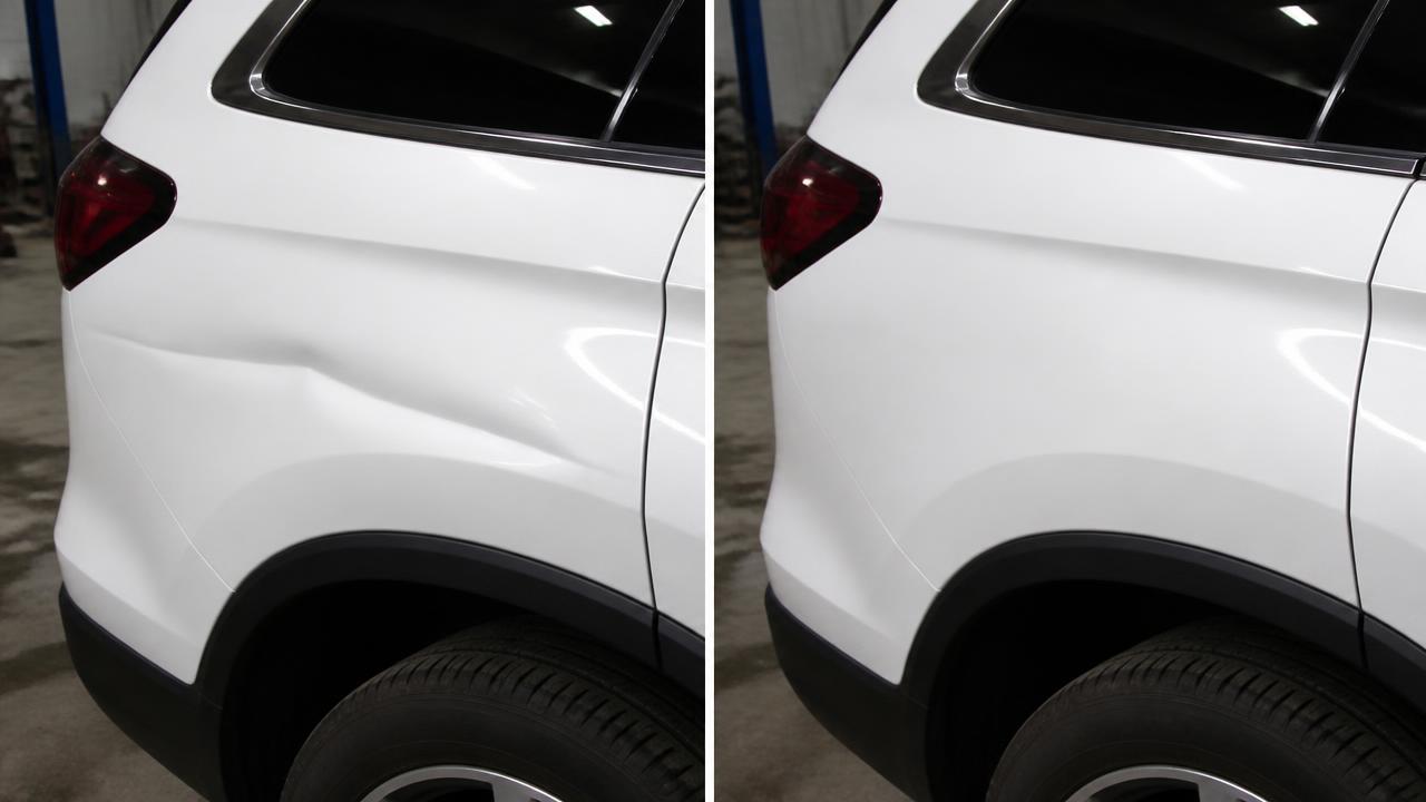 Before and after crease dent removal on a white SUV rear quarter panel with the body line restored